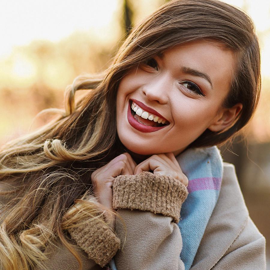 young woman from Orange, CA with a nice smile from cosmetic dentistry